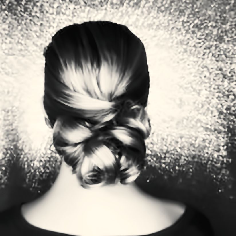 Sleek twisted low chignon